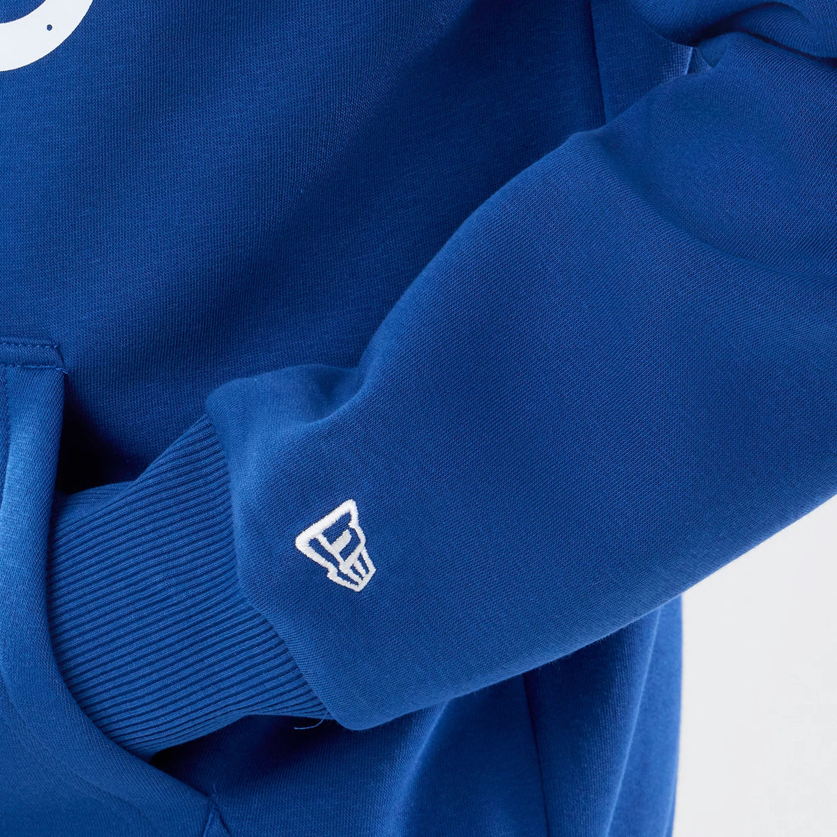 The model is wearing this NFL International Series Games 2026 Indianapolis Colts Pullover Hoodie in blue. 5