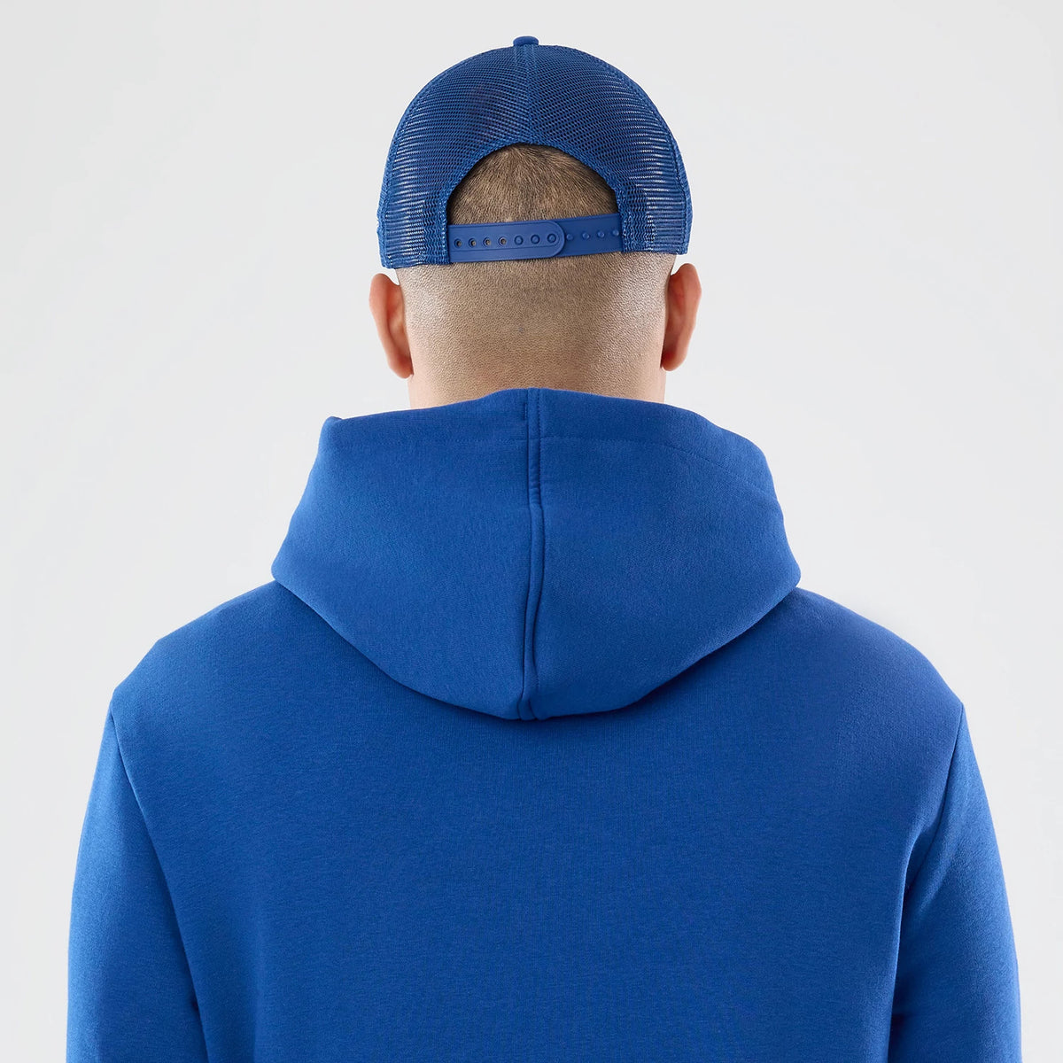 The model is wearing this NFL International Games 2026 Indianapolis Colts Pullover Hoodie in blue. 7