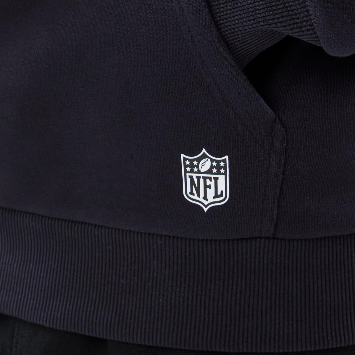 The model is wearing this NFL International Games 2026 Houston Texans Pullover Hoodie in navy. 4