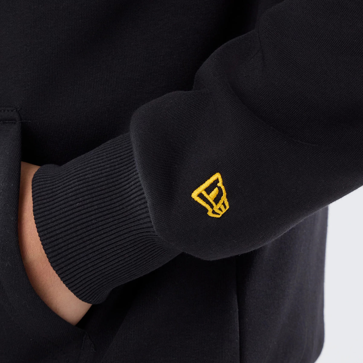 The model is wearing this NFL International Games 2026 Pittsburgh Steelers Pullover Hoodie in black. 5