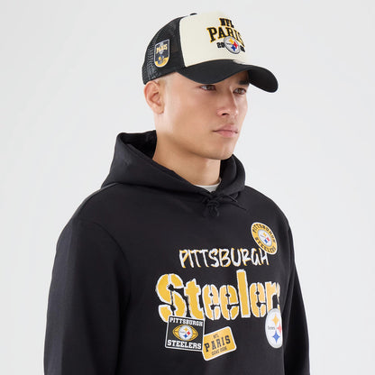 The model is wearing this NFL International Games 2026 Pittsburgh Steelers Pullover Hoodie in black. 6