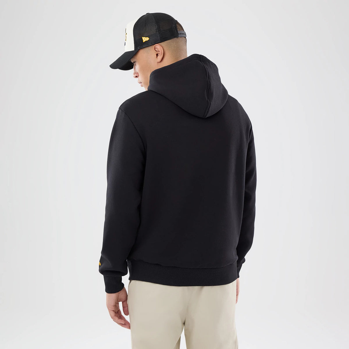 The model is wearing this NFL International Games 2026 Pittsburgh Steelers Pullover Hoodie in black. 2