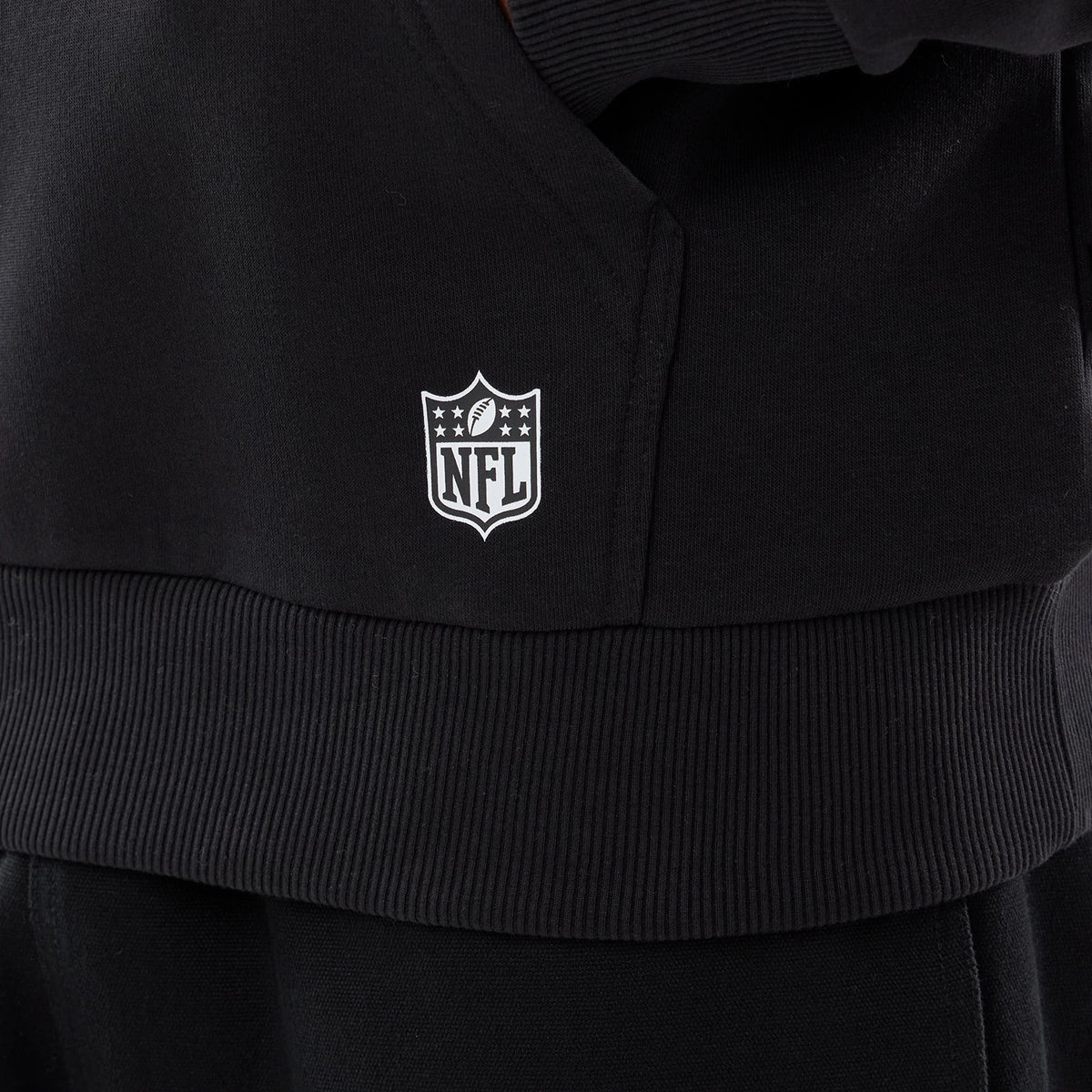 The model is wearing this NFL International Games 2026 Cincinnati Bengals Pullover Hoodie in black. 4