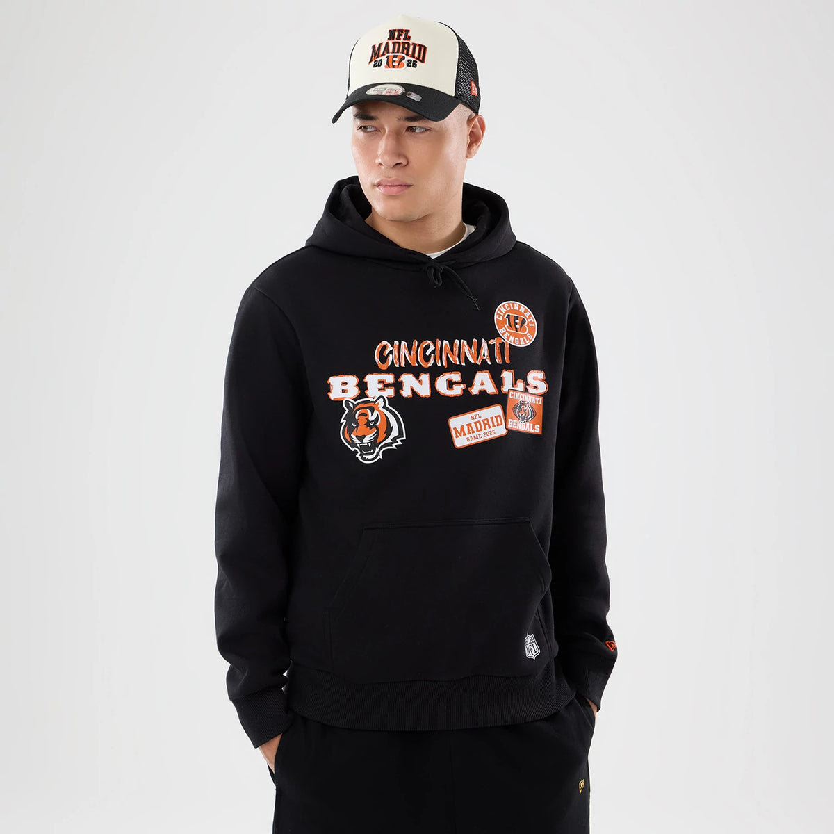 The model is wearing this NFL International Series Games 2026 Cincinnati Bengals Pullover Hoodie in black. 1