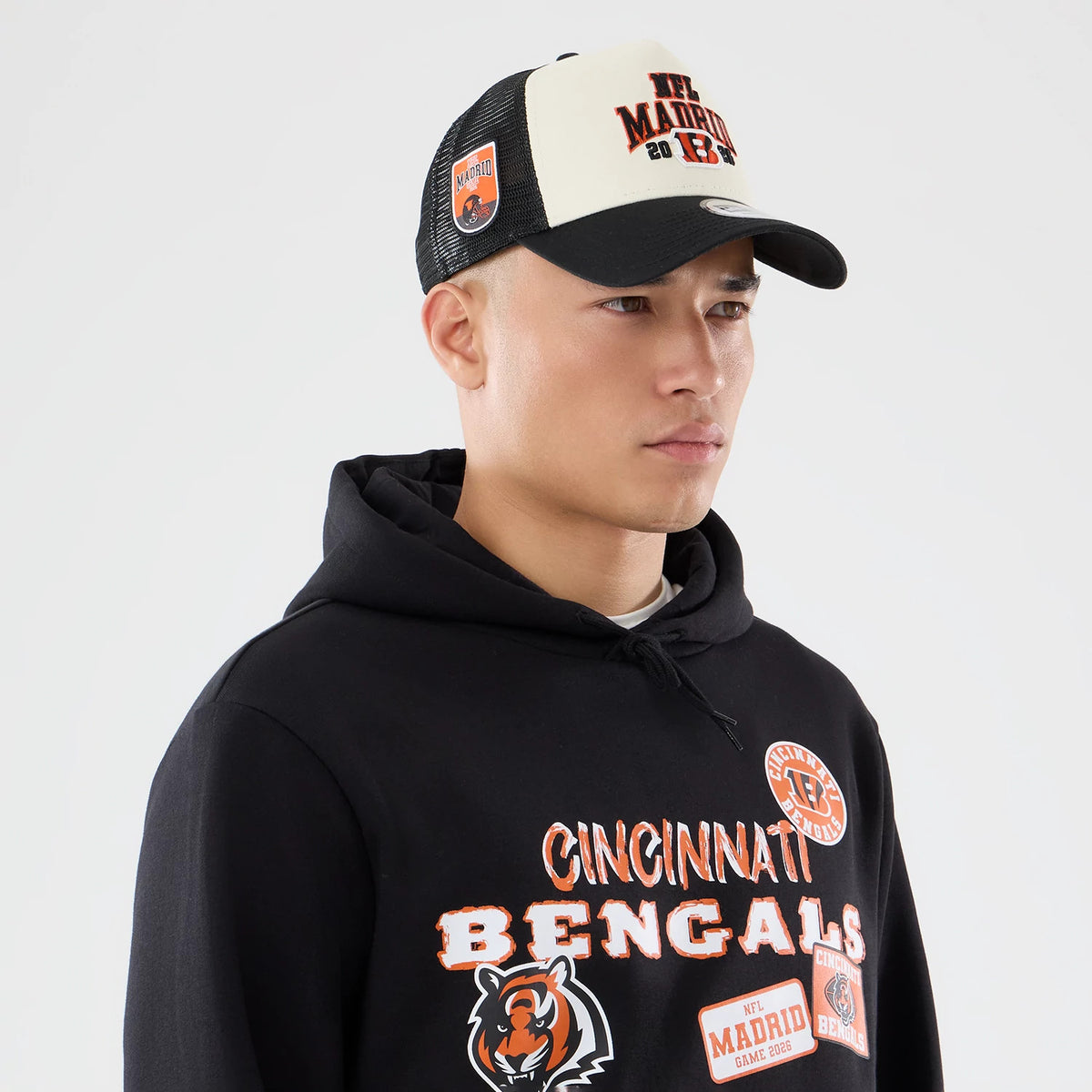 The model is wearing this NFL International Series Games 2026 Cincinnati Bengals Pullover Hoodie in black. 6