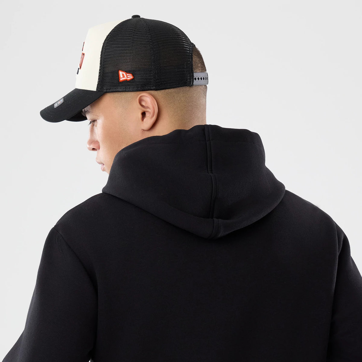 The model is wearing this NFL International Games 2026 Cincinnati Bengals Pullover Hoodie in black. 7