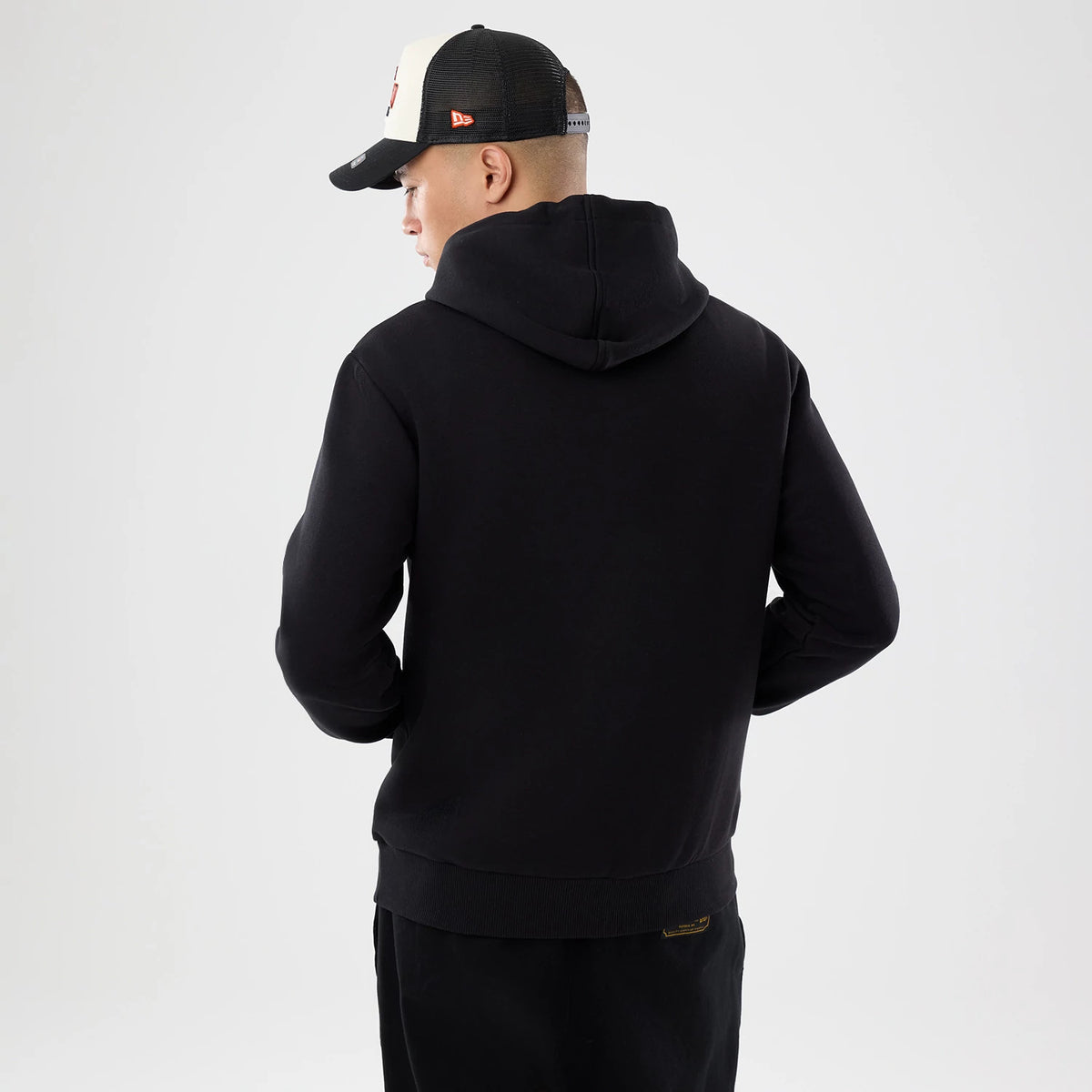The model is wearing this NFL International Games 2026 Cincinnati Bengals Pullover Hoodie in black. 2