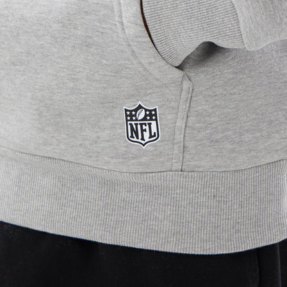 The model is wearing this NFL International Games 2026 New England Patriots Pullover Hoodie in grey. 4