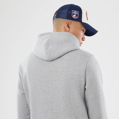 The model is wearing this NFL International Series Games 2026 New England Patriots Pullover Hoodie in grey. 7