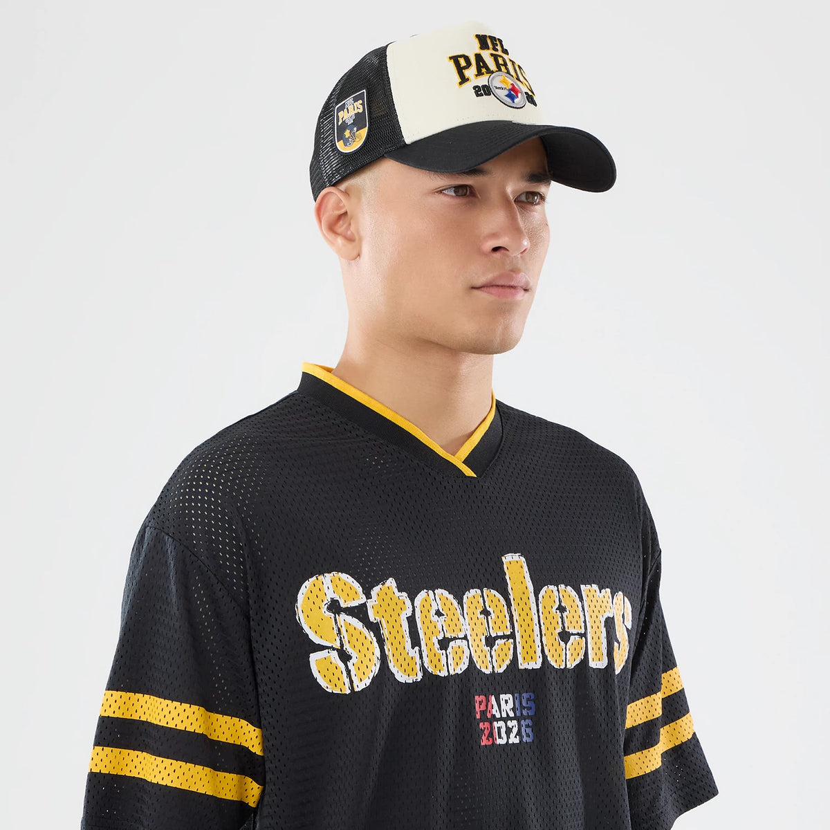 The model is wearing this NFL International Games 2026 Pittsburgh Steelers Mesh Jersey in black. 6