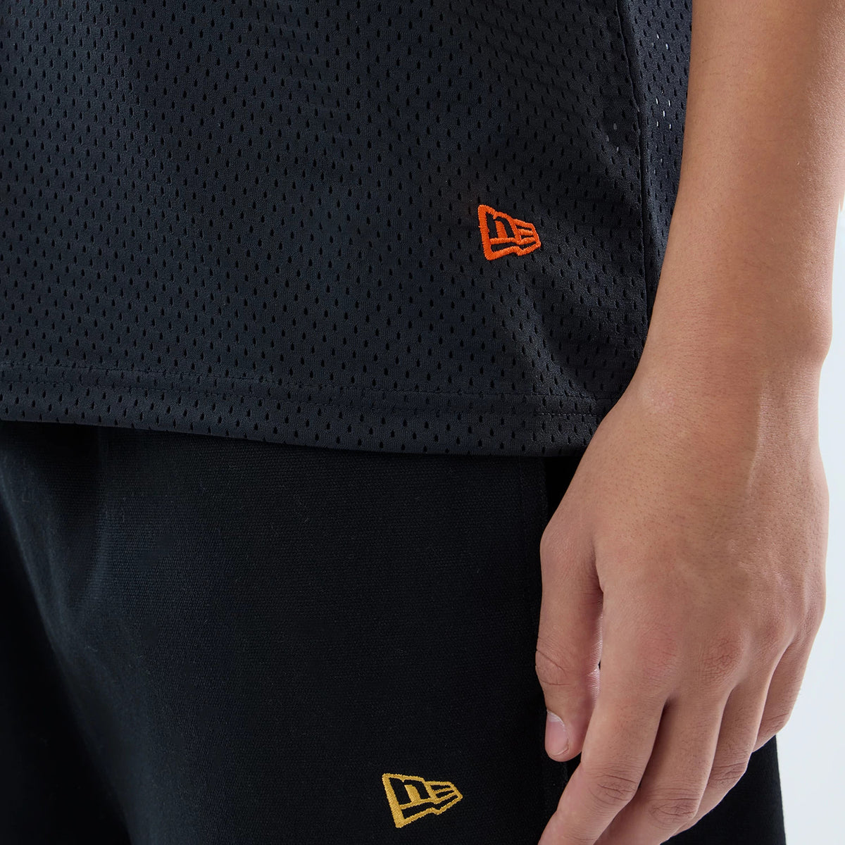 The model is wearing this NFL International Games 2026 Cincinnati Bengals Mesh Jersey in black. 5