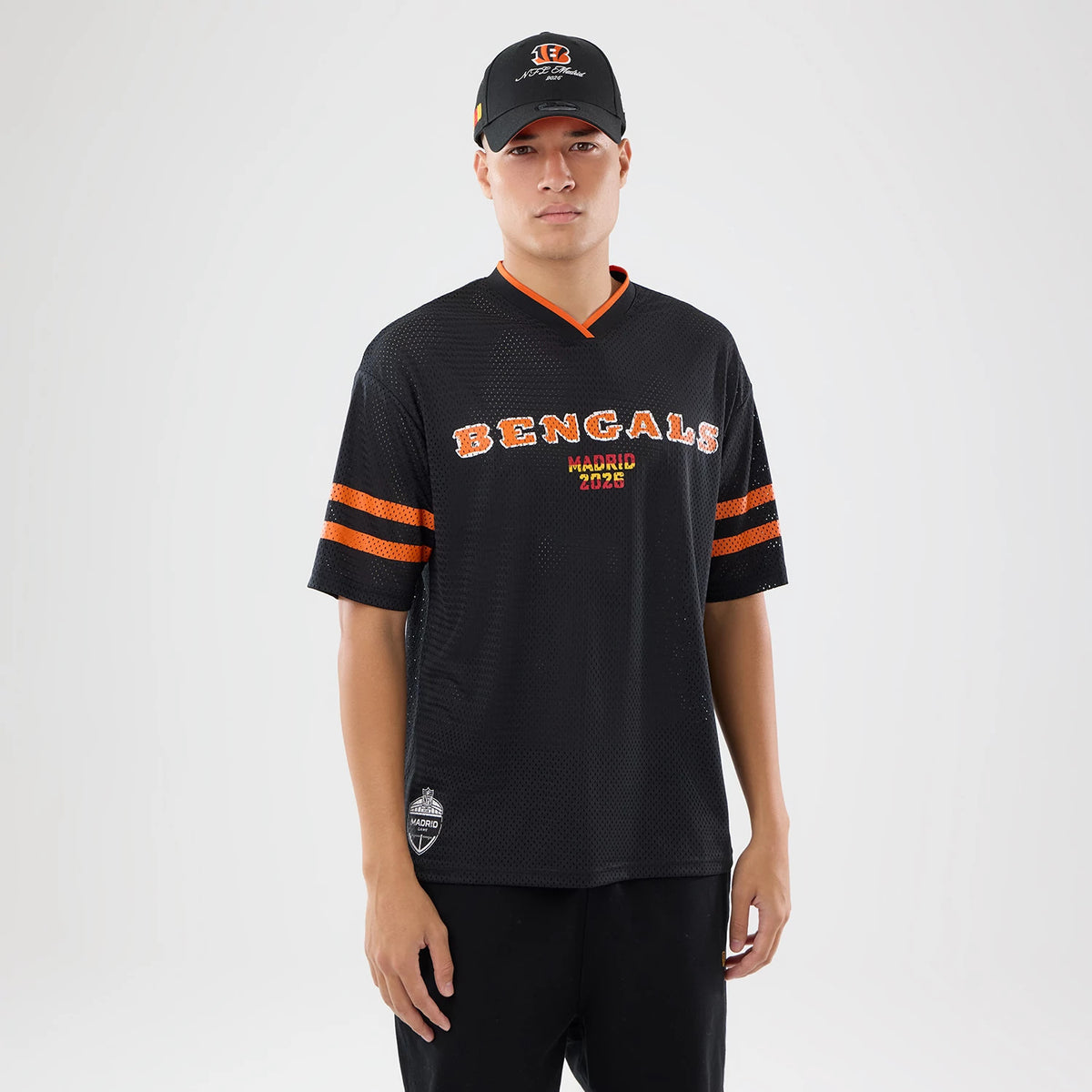 The model is wearing this NFL International Games 2026 Cincinnati Bengals Mesh Jersey in black. 1