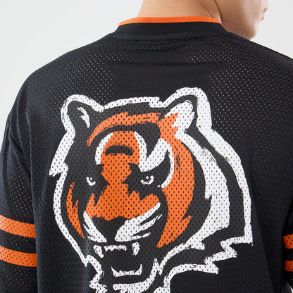 The model is wearing this NFL International Games 2026 Cincinnati Bengals Mesh Jersey in black. 7