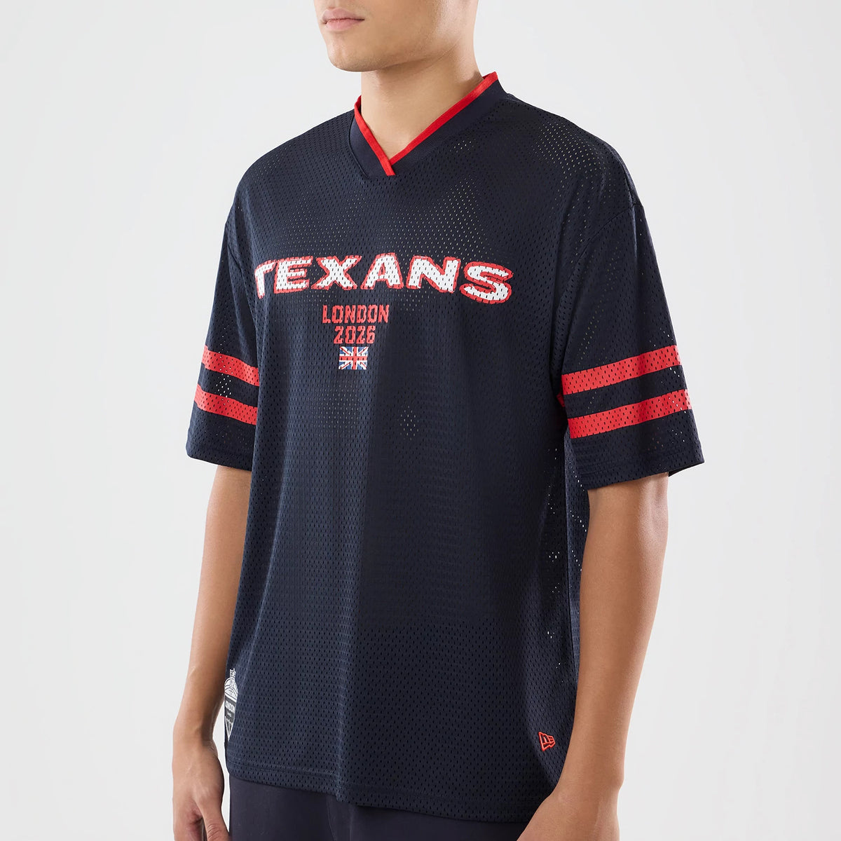 The model is wearing this NFL International Games 2026 Houston Texans Mesh Jersey in navy. 3
