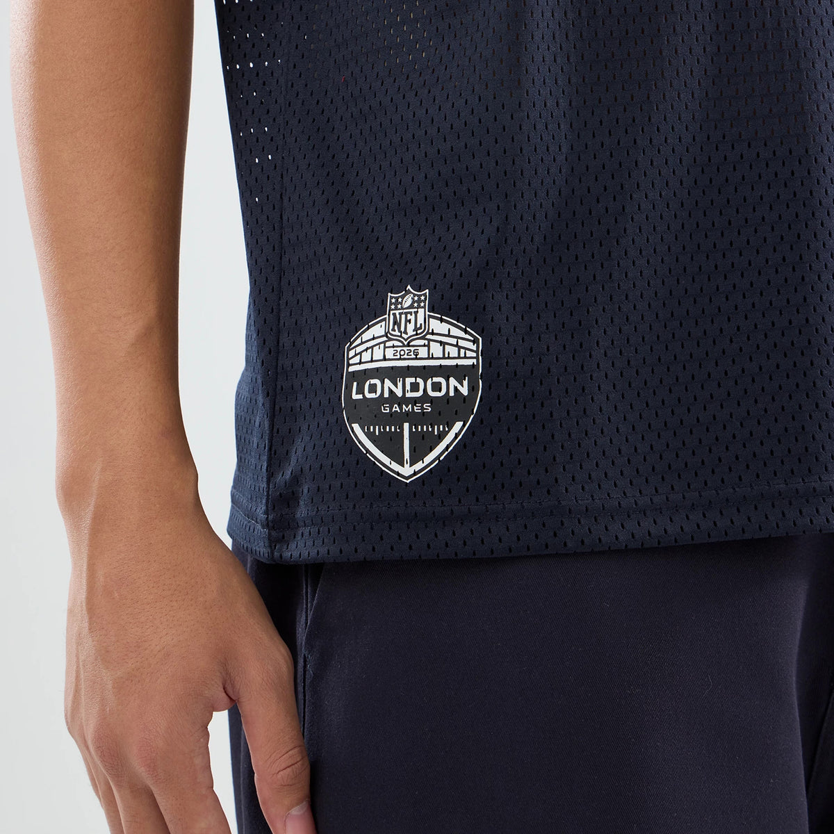 The model is wearing this NFL International Games 2026 Houston Texans Mesh Jersey in navy. 4