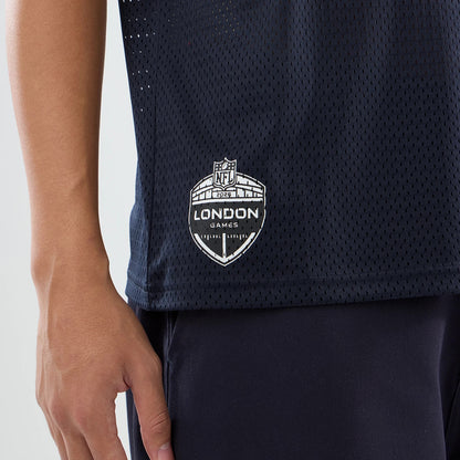 The model is wearing this NFL International Games 2026 Houston Texans Mesh Jersey in navy. 4