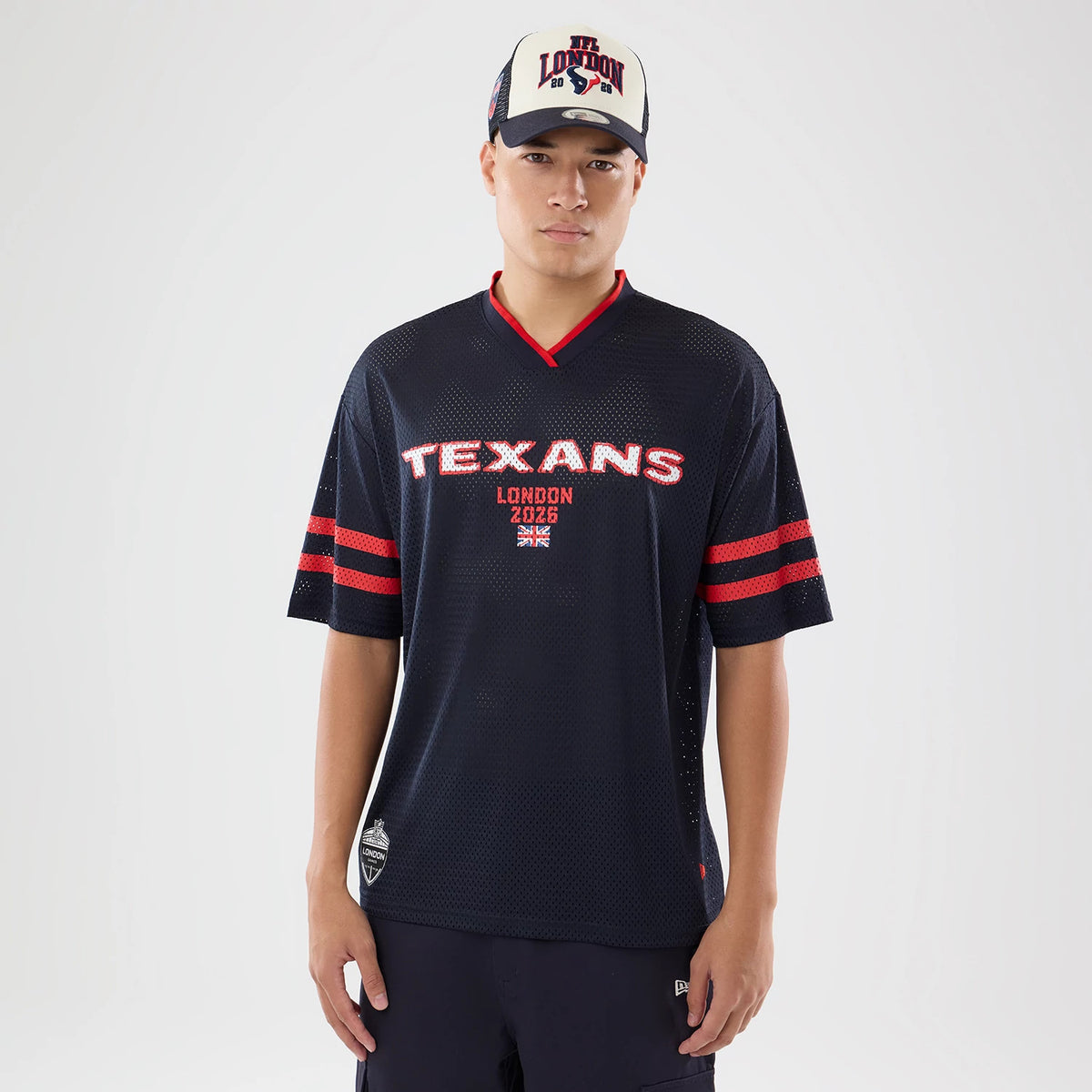 The model is wearing this NFL International Games 2026 Houston Texans Mesh Jersey in navy. 1