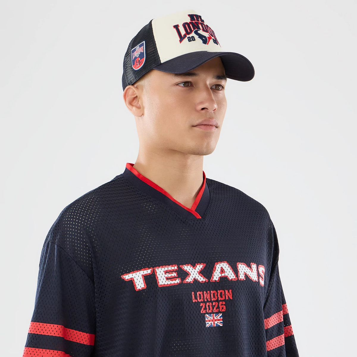 The model is wearing this NFL International Games 2026 Houston Texans Mesh Jersey in navy. 6