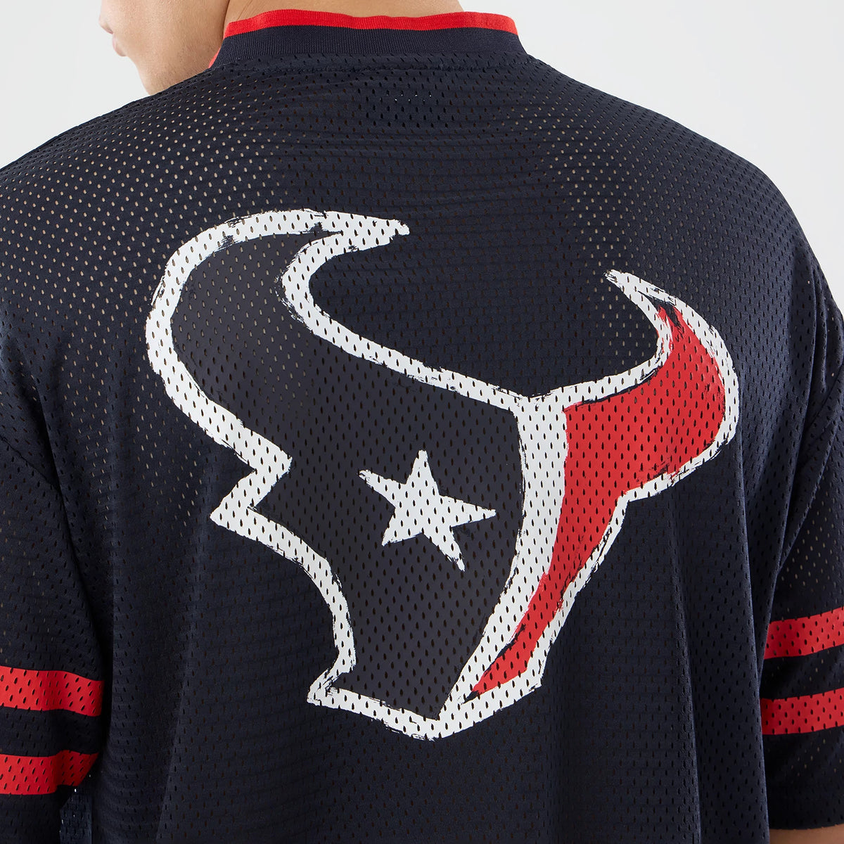 The model is wearing this NFL International Games 2026 Houston Texans Mesh Jersey in navy. 7