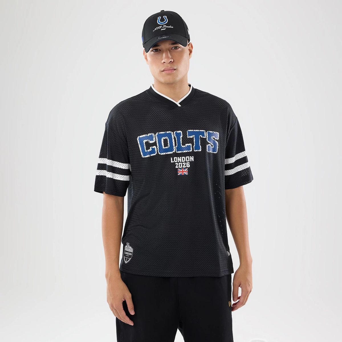 The model is wearing this NFL International Series Games 2026 Indianapolis Colts Mesh Jersey in black. 1
