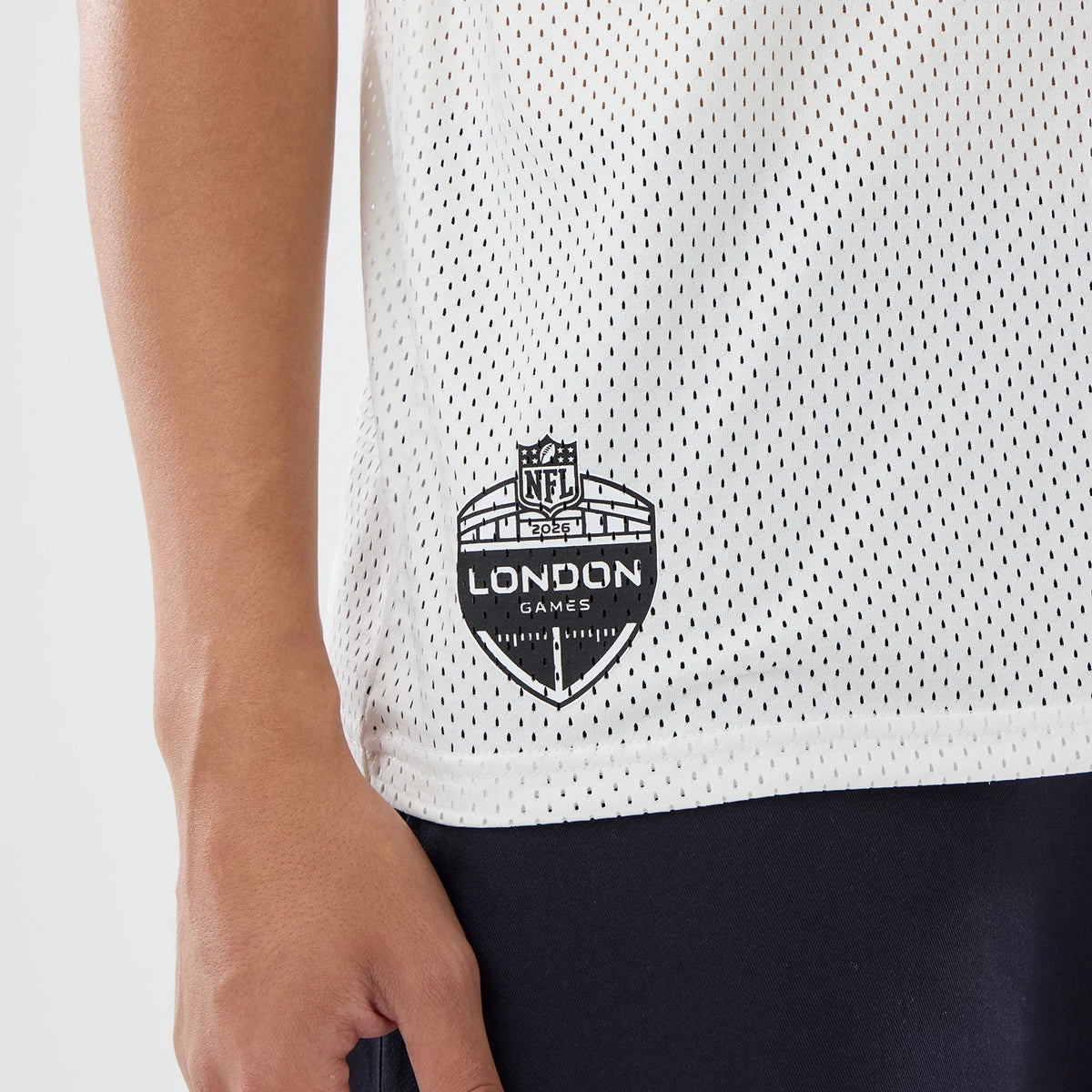 The model is wearing this NFL International Games 2026 Philadelphia Eagles Mesh Jersey in white. 4