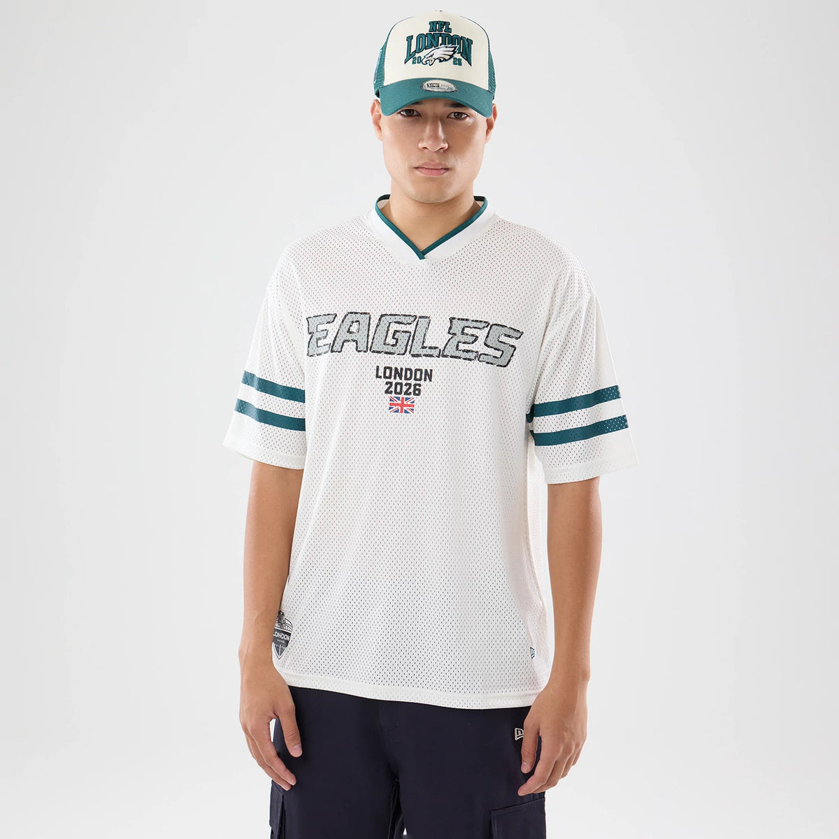 The model is wearing this NFL International Games 2026 Philadelphia Eagles Mesh Jersey in white. 1