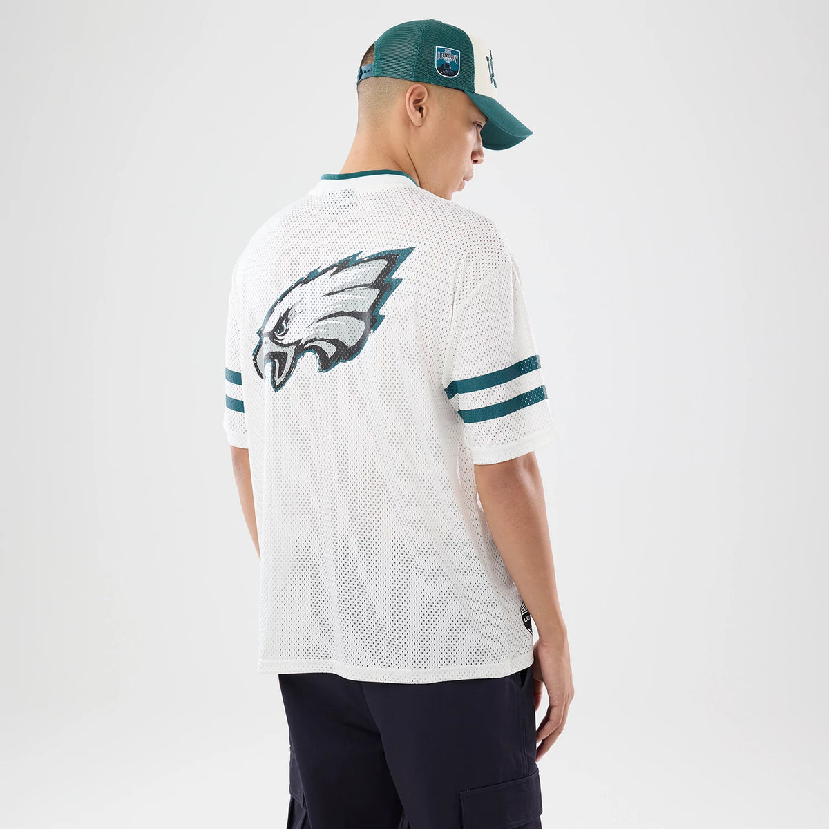 The model is wearing this NFL International Games 2026 Philadelphia Eagles Mesh Jersey in white. 2