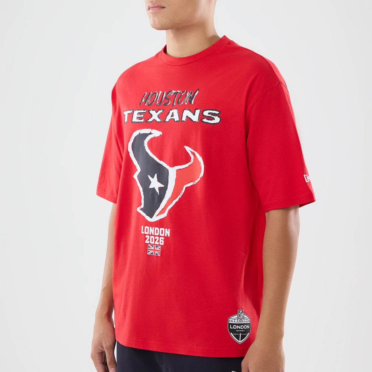 The model is wearing this NFL International Games 2026 Houston Texans Oversized T-Shirt in red. 3