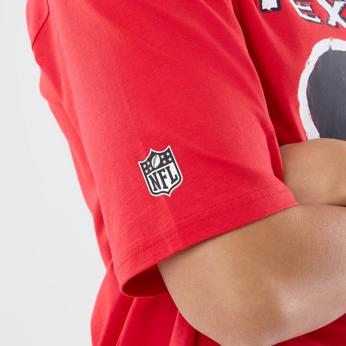 The model is wearing this NFL International Games 2026 Houston Texans Oversized T-Shirt in red. 4