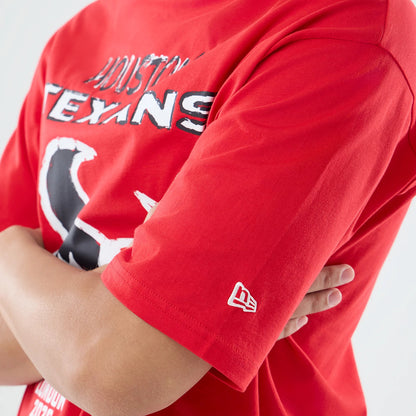 The model is wearing this NFL International Games 2026 Houston Texans Oversized T-Shirt in red. 5
