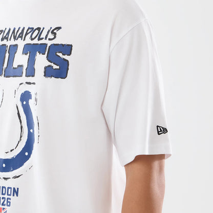 The model is wearing this NFL International Series Games 2026 Indianapolis Colts Oversized T-Shirt in white. 5