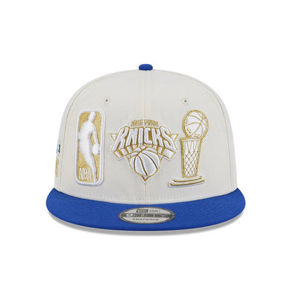 Pictured is this NBA '26 Ring Off New York Knicks 9FIFTY Snapback cap in blue. 3