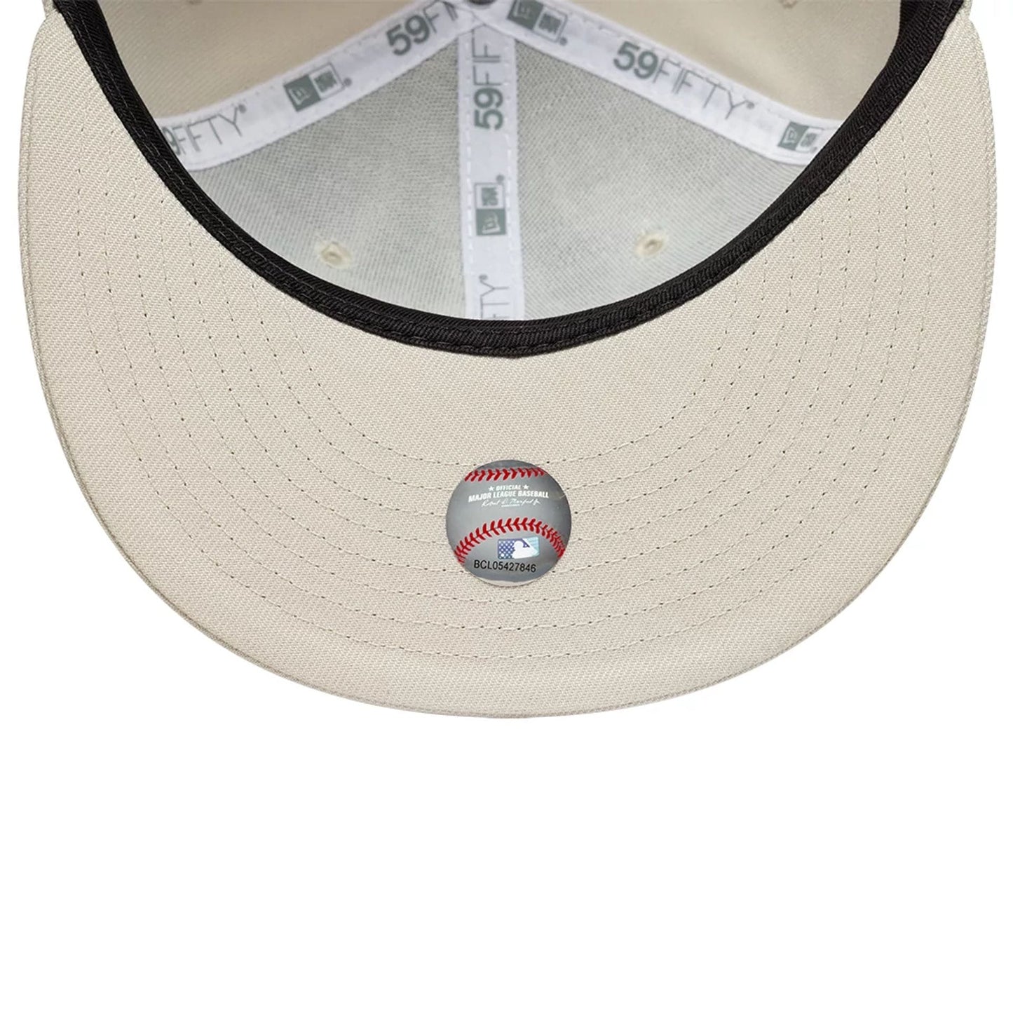 Pictured is this MLB New York Yankees 59FIFTY Fitted cap in beige. 2