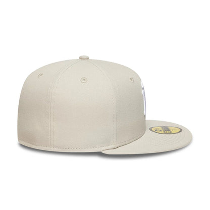 Pictured is this MLB New York Yankees 59FIFTY Fitted cap in beige. 7