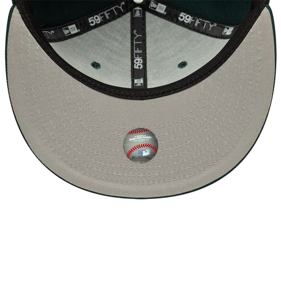 Pictured is this MLB Chicago White Sox 59FIFTY Fitted cap in dark green. 2