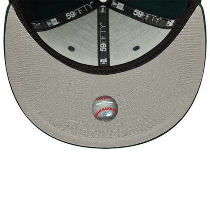 Pictured is this MLB Chicago White Sox Core 59FIFTY Fitted cap in dark green. 2