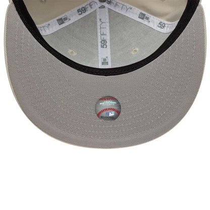 Pictured is this MLB Chicago White Sox 59FIFTY Fitted cap in beige. 2