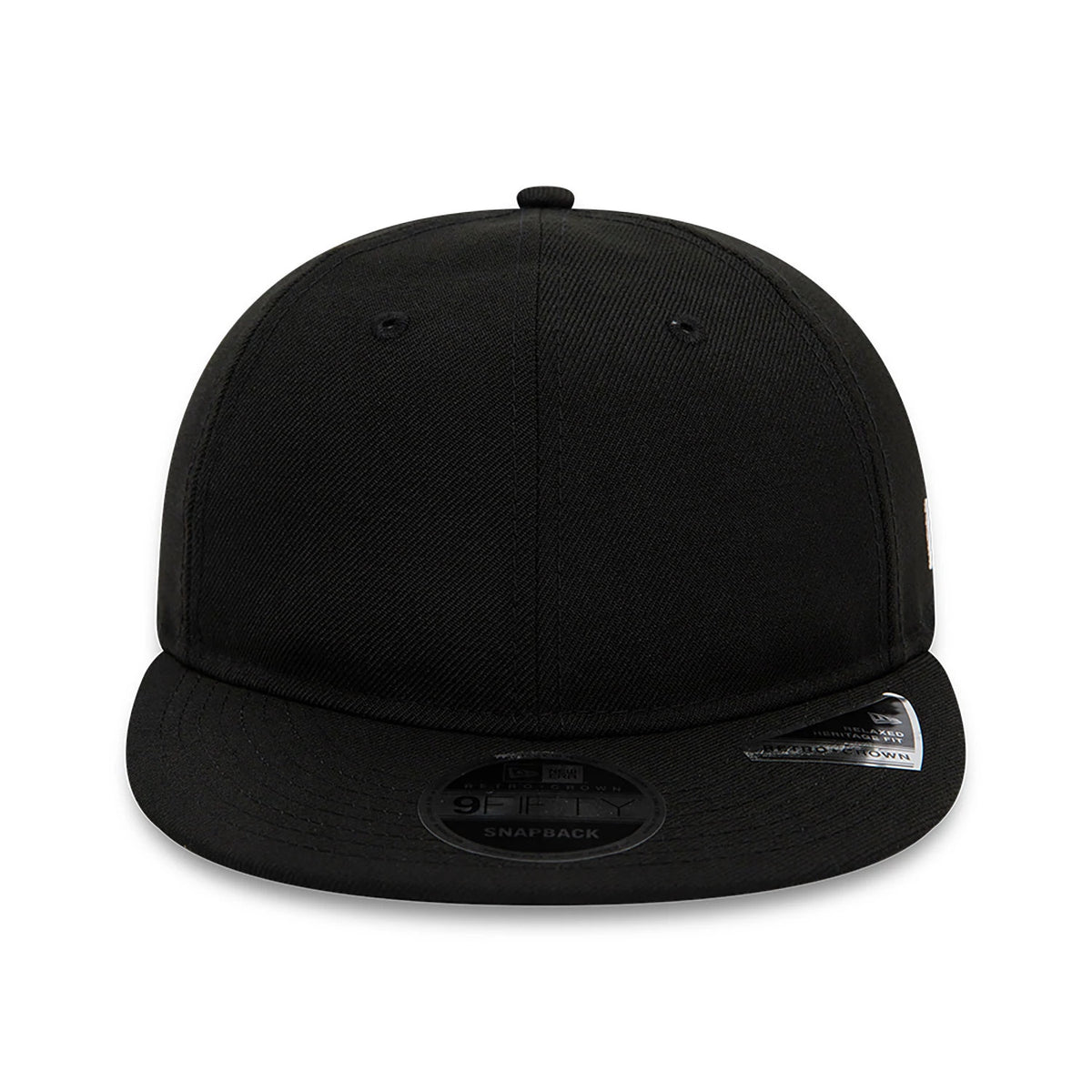 Blank New Era Black Retro Crown 9FIFTY Snapback Cap, front view showing a solid black crown with eyelets and top button, flat visor with a 9FIFTY size sticker, and a sticker on the right side of the visor.