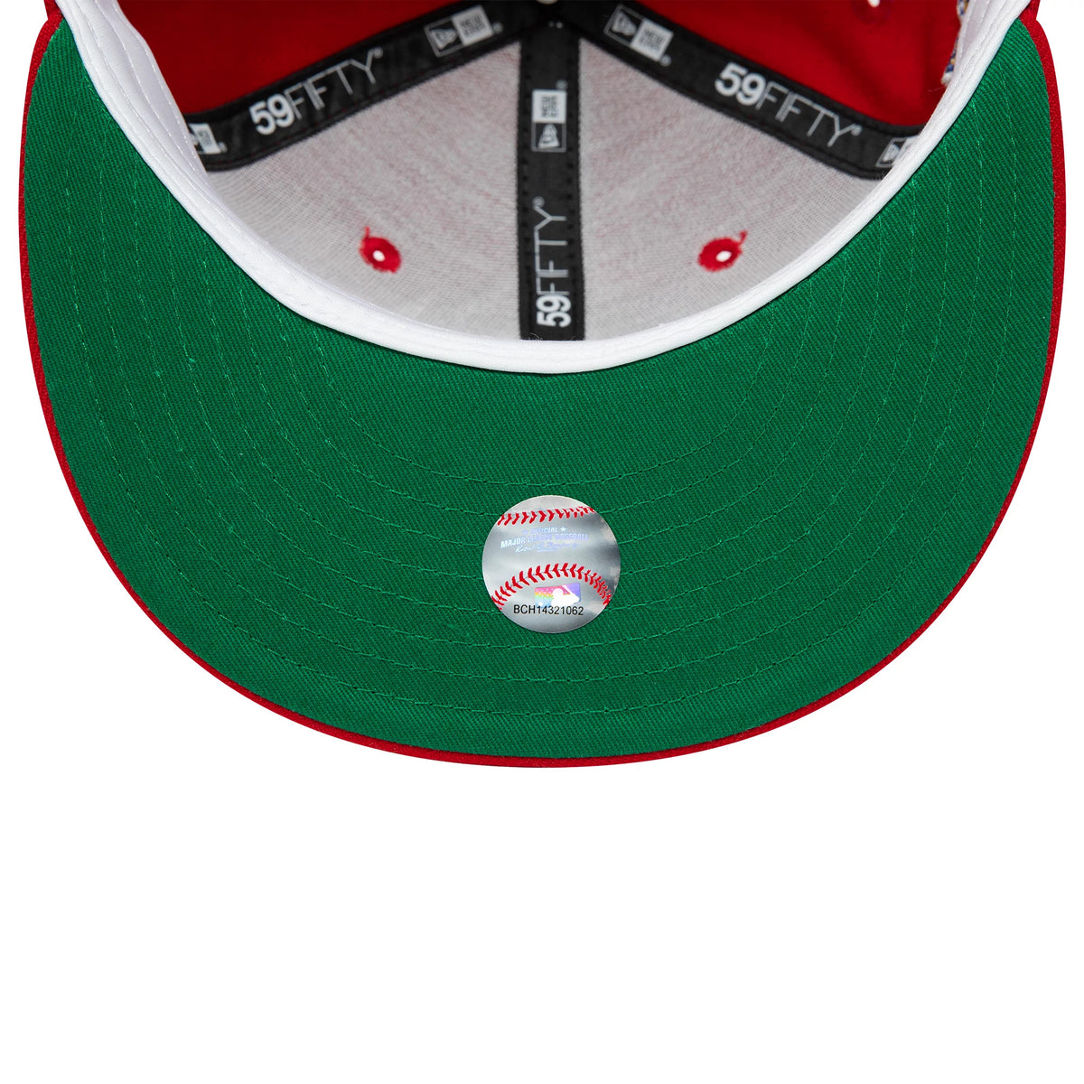 New York Yankees MLB World Series 1996 Red New Era 59FIFTY Fitted Cap, inside view showing grey taping with New Era branding, a green undervisor, and a baseball-themed sticker placed centrally.