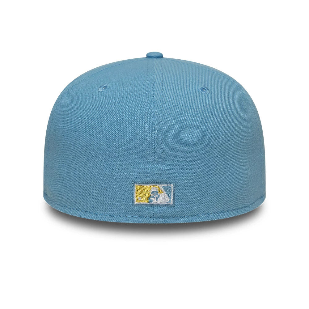 Athletics MLB Pastel Blue New Era 59FIFTY Fitted Cap, rear view showing the MLB Batterman logo embroidered at the centre back, surrounded by a structured pastel blue crown with embroidered eyelets and a matching top button.
