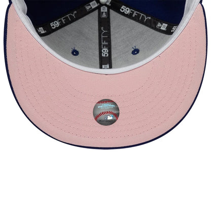 Pictured is this MLB Heart LA Dodgers 59FIFTY Fitted cap in dark blue. 2