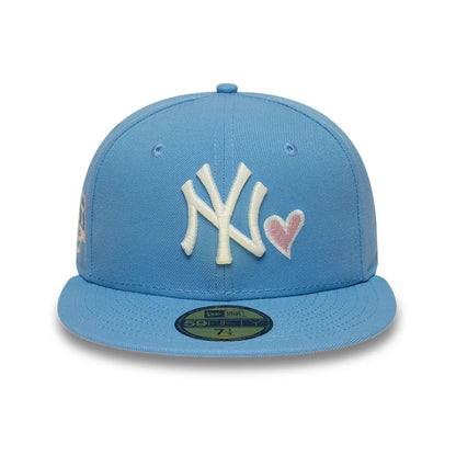 Pictured is this MLB Heart New York Yankees 59FIFTY Fitted cap in pastel blue. 3