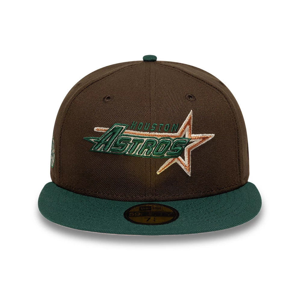 Astros MLB Cooperstown Dark Brown & Dark Green New Era 59FIFTY Fitted Cap, front view showing the raised embroidered Astros logo in dark green and orange on the brown crown, complemented by a dark green visor with a gold 59FIFTY size sticker.