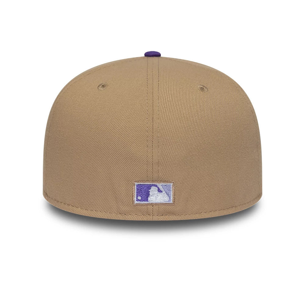 Houston Astros MLB Cooperstown Beige New Era 59FIFTY Fitted Cap, rear view showing the purple and white MLB Batterman logo centred on the back panels, beneath a top button in contrasting purple, on a beige structured crown.