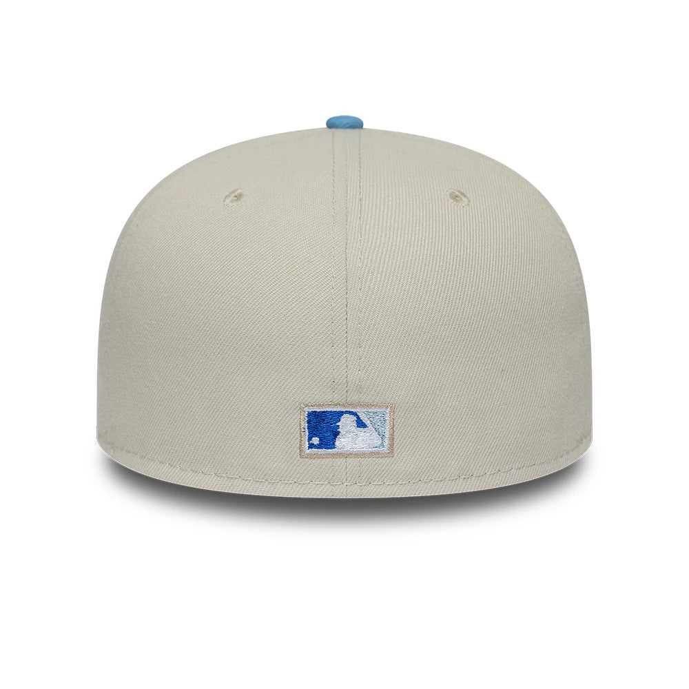 Colorado Rockies MLB Cooperstown Cream New Era 59FIFTY Fitted Cap, rear view showing the blue and white embroidered MLB Batterman logo at the centre back, set low on the structured cream crown with a light blue top button.