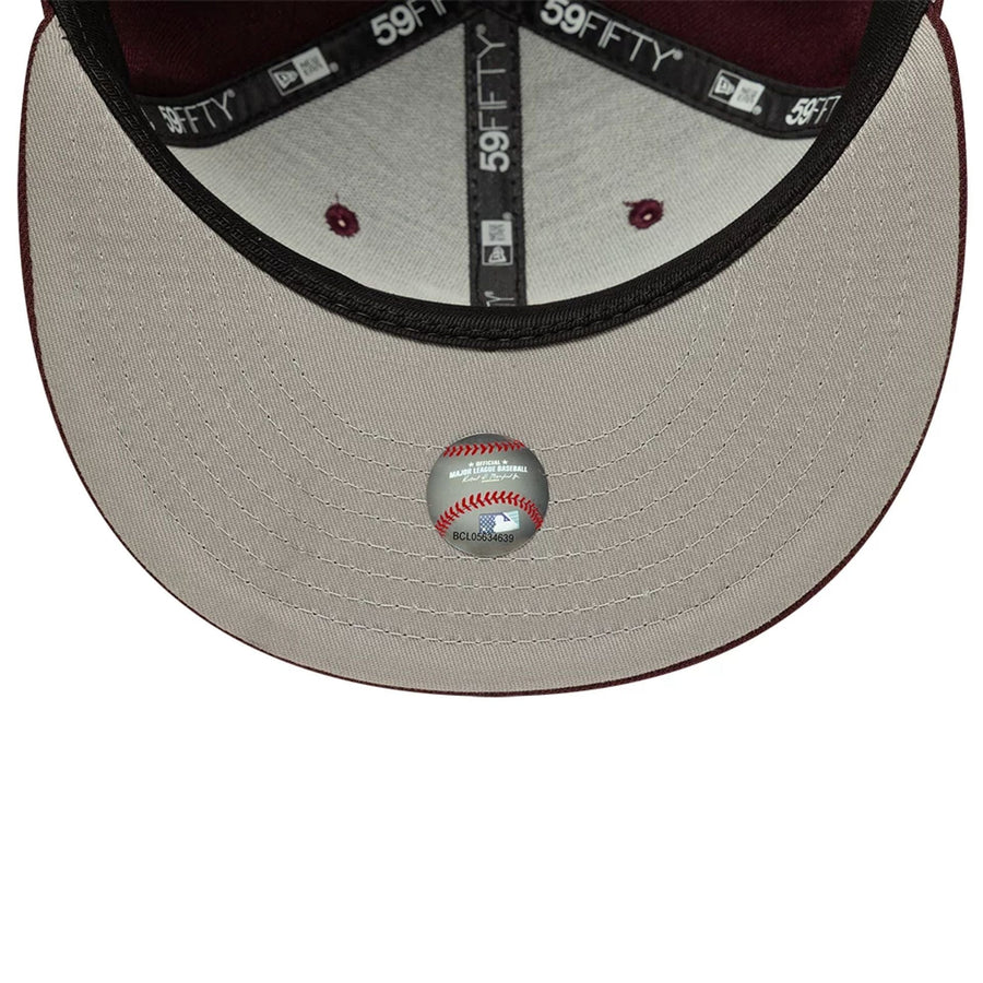 Pictured is this MLB Atlanta Braves 59FIFTY Fitted cap in dark purple. 2