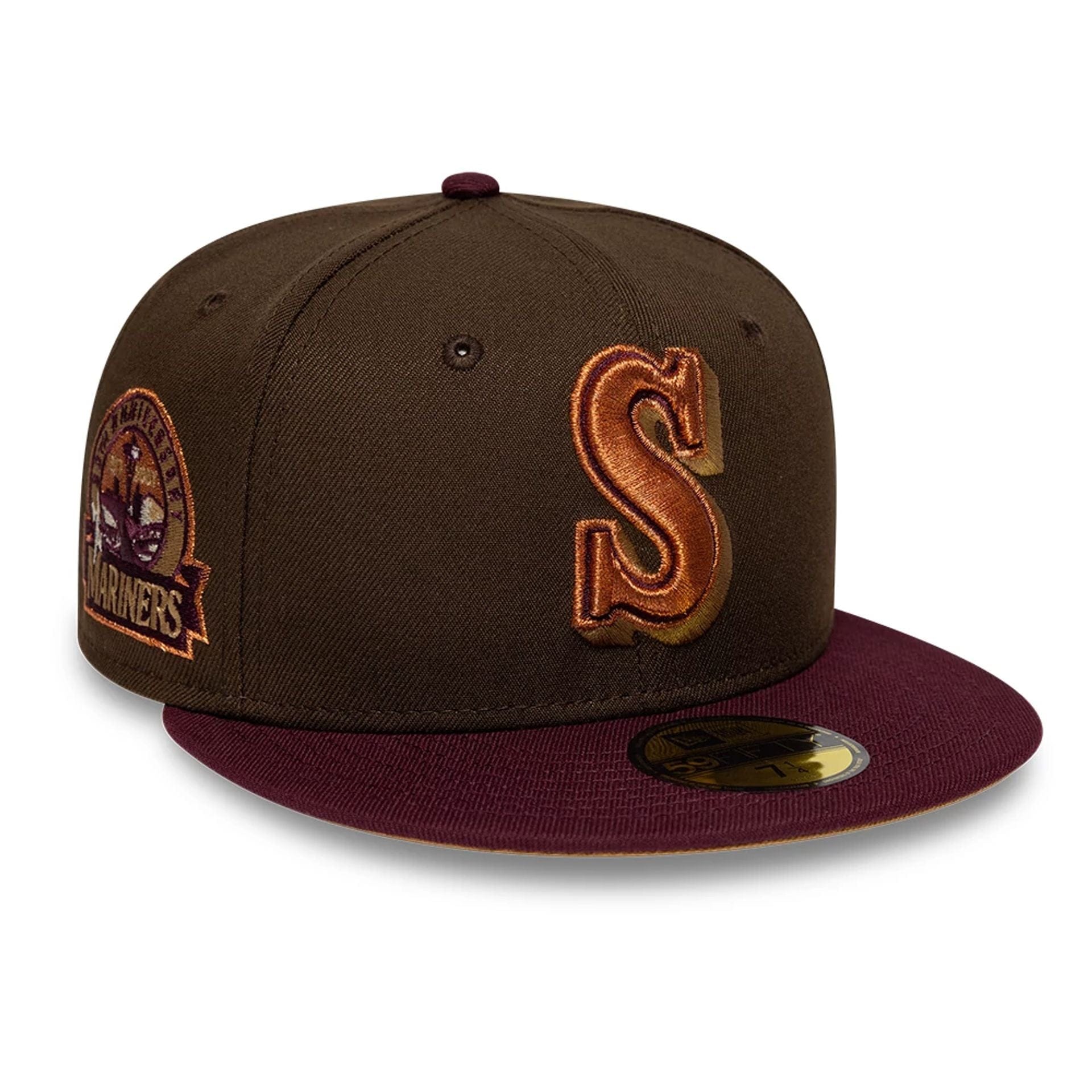 Pictured is this MLB Cooperstown Seattle Mariners 59FIFTY Fitted cap in dark brown. 1