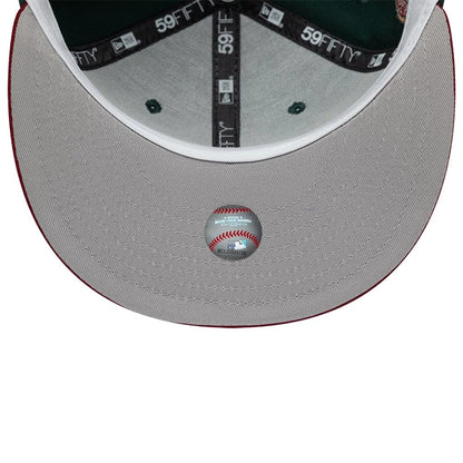 Pictured is this MLB Cooperstown Seattle Mariners 59FIFTY Fitted cap in dark green. 2