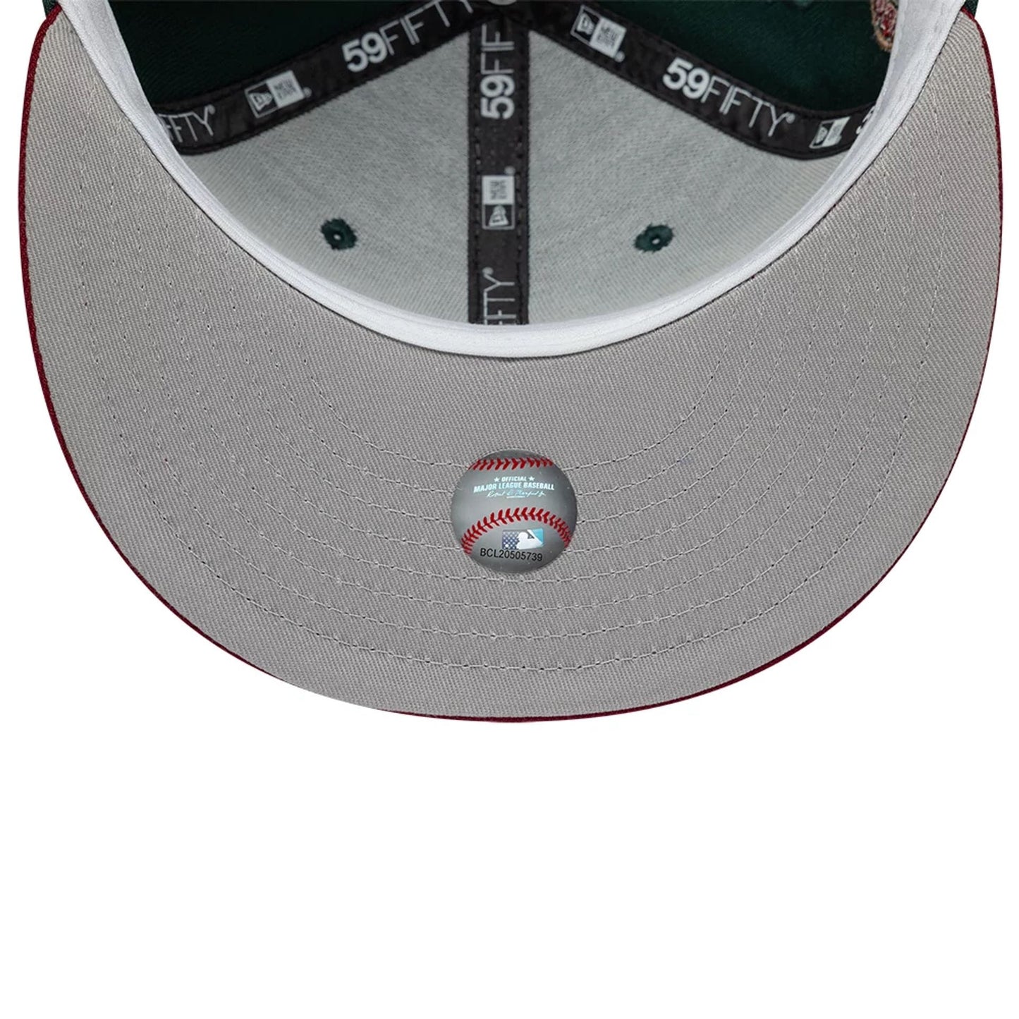 Pictured is this MLB Cooperstown Seattle Mariners 59FIFTY Fitted cap in dark green. 2