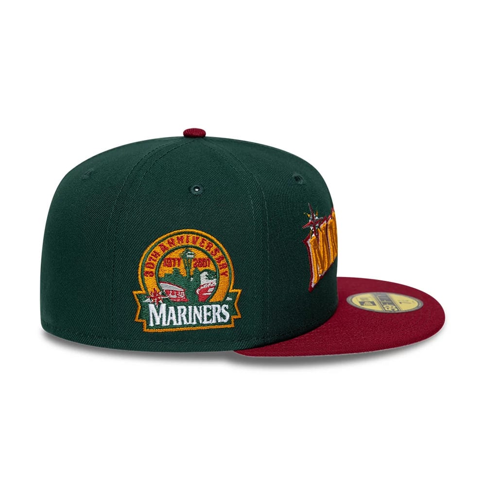 Pictured is this MLB Cooperstown Seattle Mariners 59FIFTY Fitted cap in dark green. 6